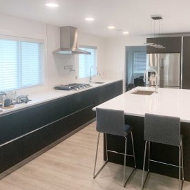 Custom Dark Cabinet with White Countertop